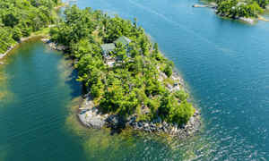 This Island Is For Sale - And It Comes With A Restored 110 Year Old Cabin